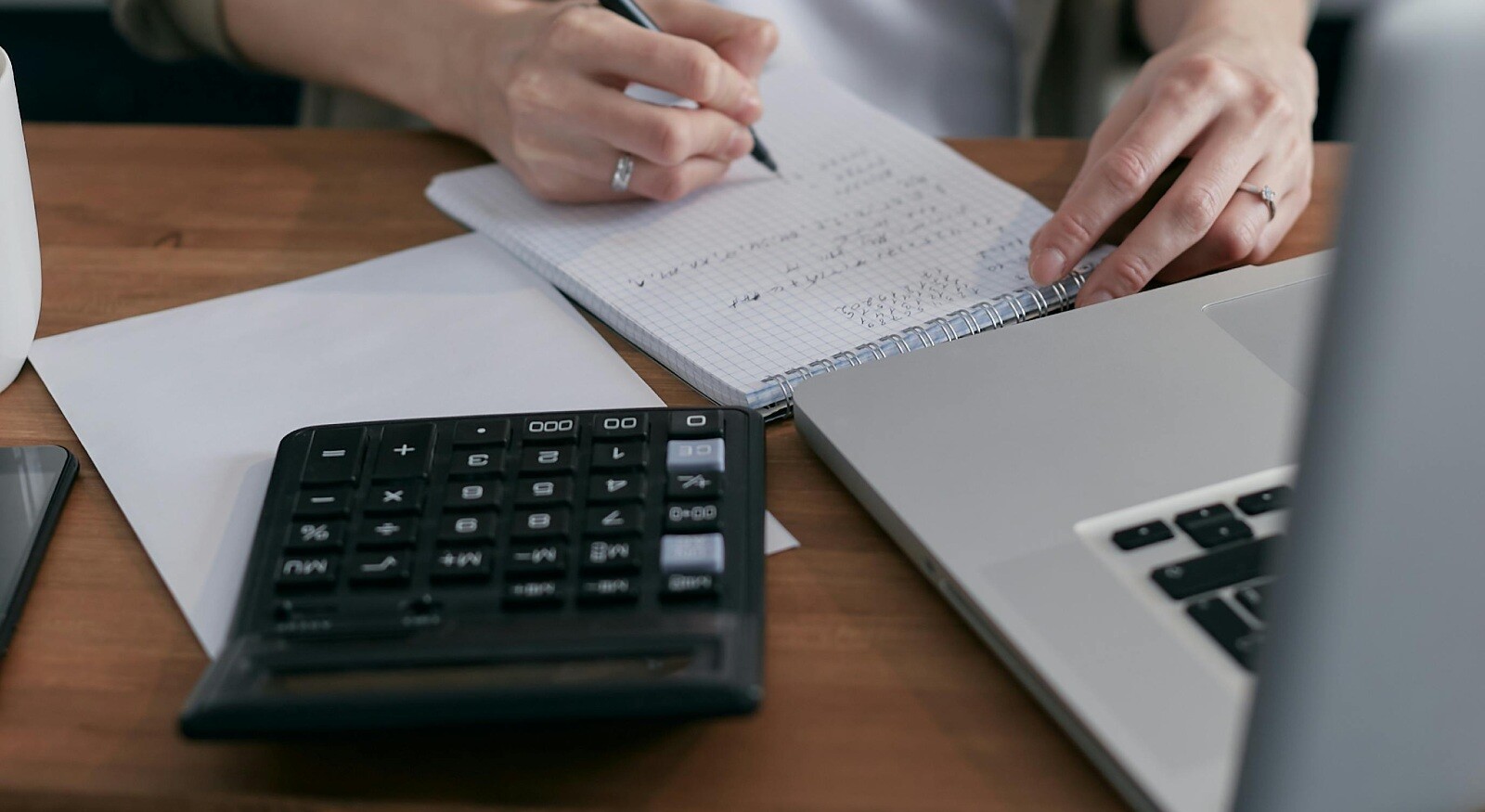 A woman looking at the billing process for a project