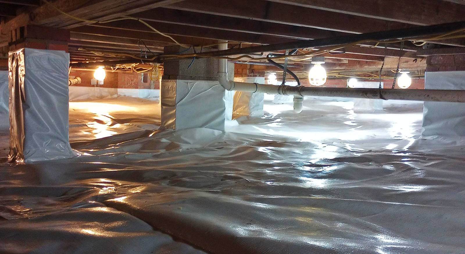 A crawl space encapsulated with permanent lights