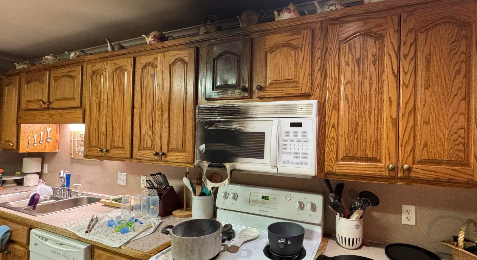 A kitchen damaged by fire.