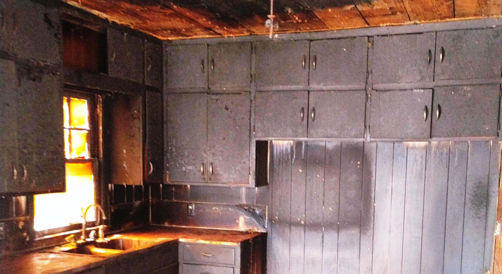 Kitchen affected by fire damage