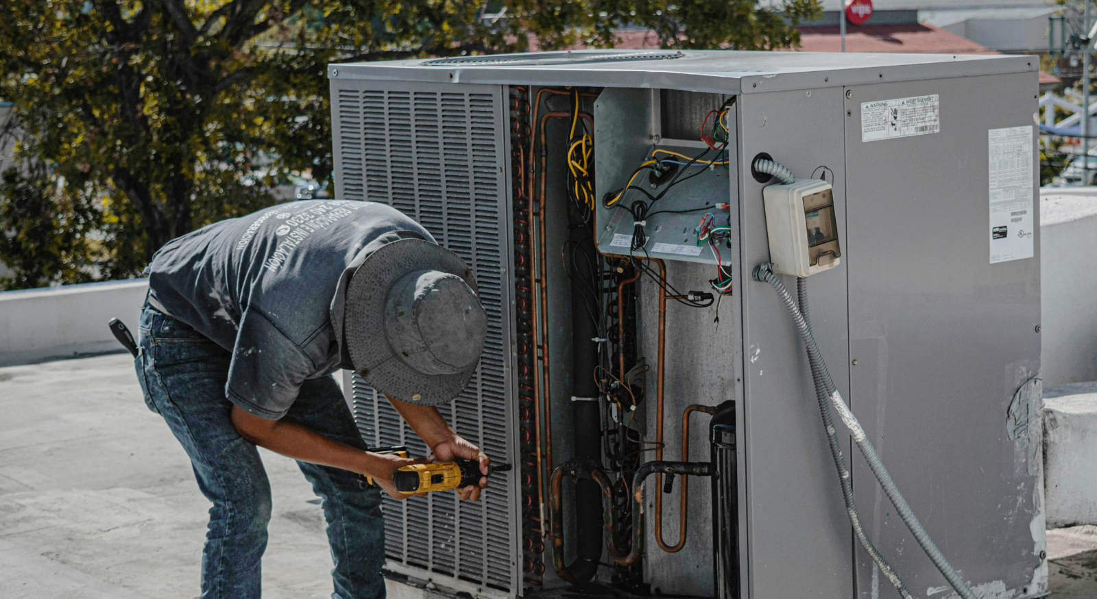 A technician inspecting an HVAC system