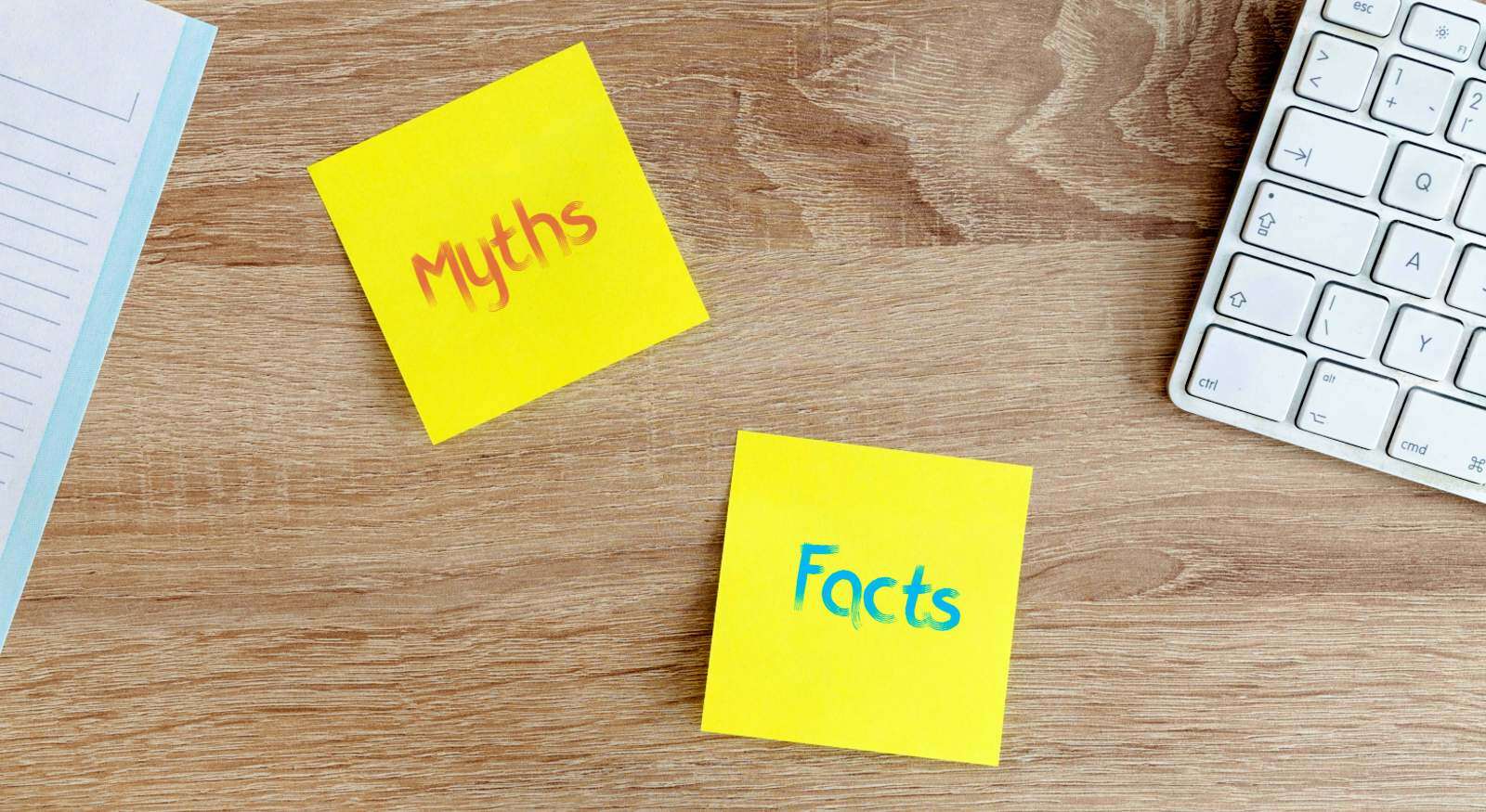 A wall with sticky notes on myths and facts.