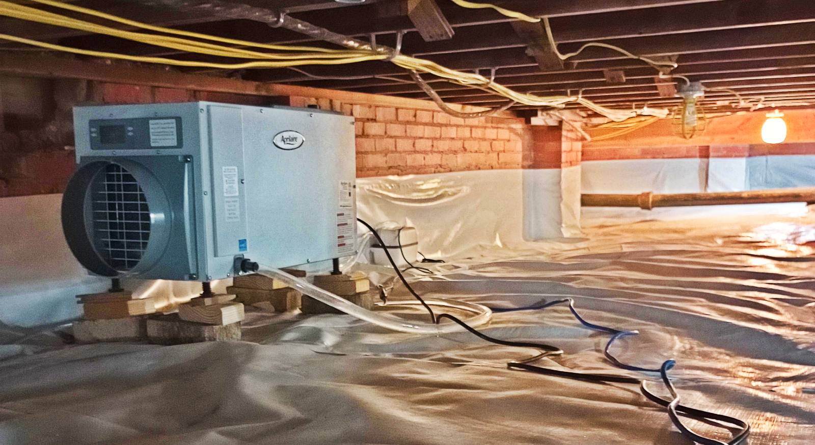 Dehumidifier in a crawl space encapsulated